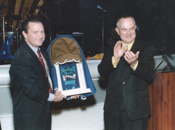 Lee Cockerell honoring Ron with a miniature version of his Window